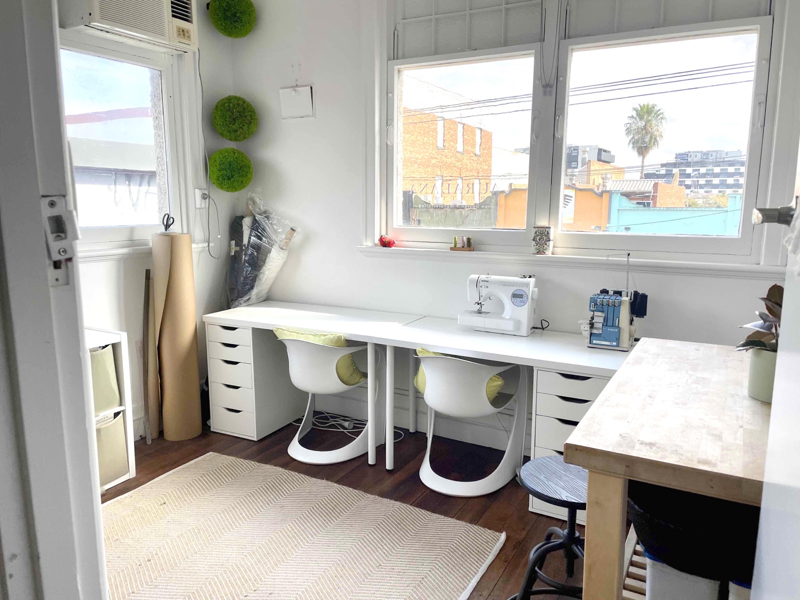 Maker studio with sewing machines and workbench
