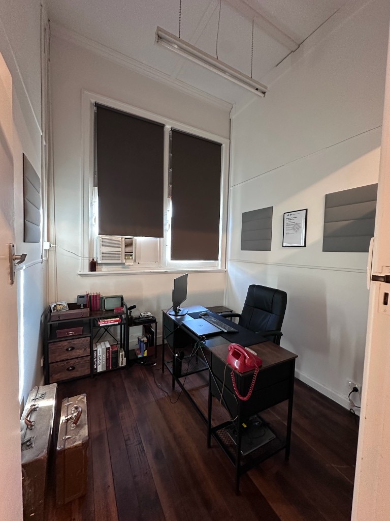 Studio 2 — quiet private office with desk, acoustic panels and high ceilings